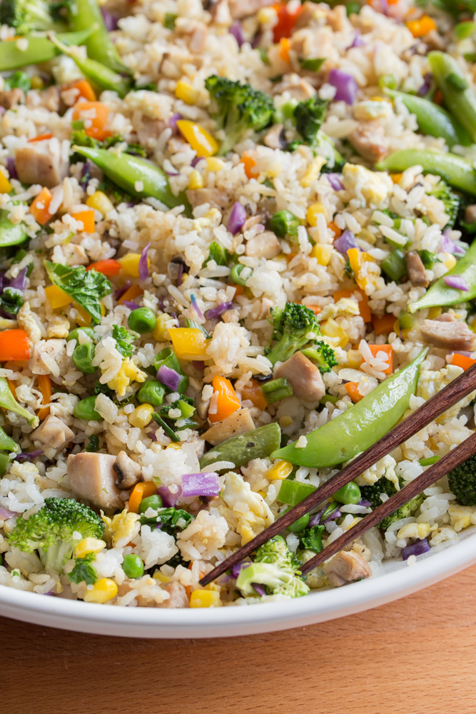 In need of a cheap healthy meal to feed a crowd? This Loaded Fried Rice is a budget-friendly dinner that uses leftovers from your refrigerator. Turn everyone's favorite side dish into a satisfying, 30-minute meal!