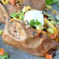 Introducing your new favorite Taco Tuesday recipe...Taco Stuffed Sweet Potatoes. This delicious cheap healthy meal is naturally gluten free. A simple, budget-friendly meal that's perfect for a weeknight dinner.