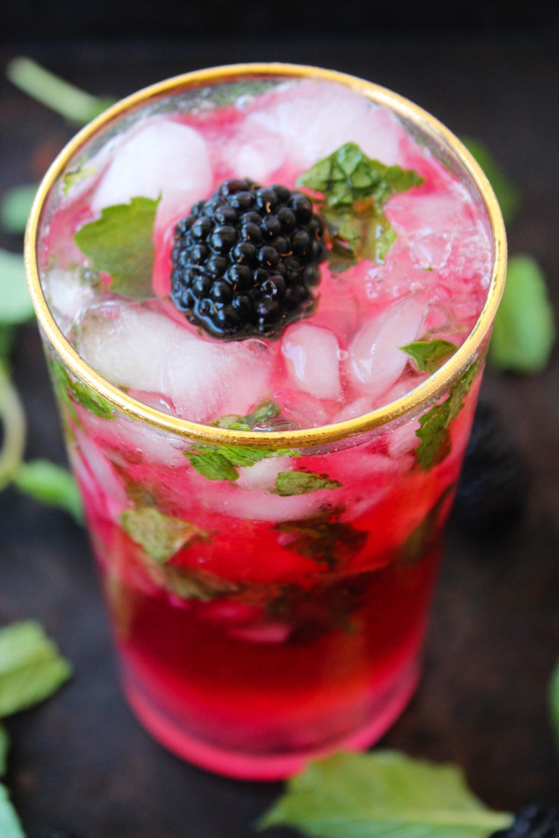 These Blackberry Mint Mojitos are a classic cocktail with a farmers market fresh twist. Skip the $14 happy hour cocktail and entertain friends at home over this refreshingly fruity cocktail recipe.