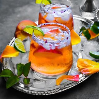 Liven up happy hour with this unique Peach Rose-a-Rita cocktail. The classic margarita gets a flavorful makeover with hints of rose and peach. This is the perfect summer cocktail for outdoor entertaining.