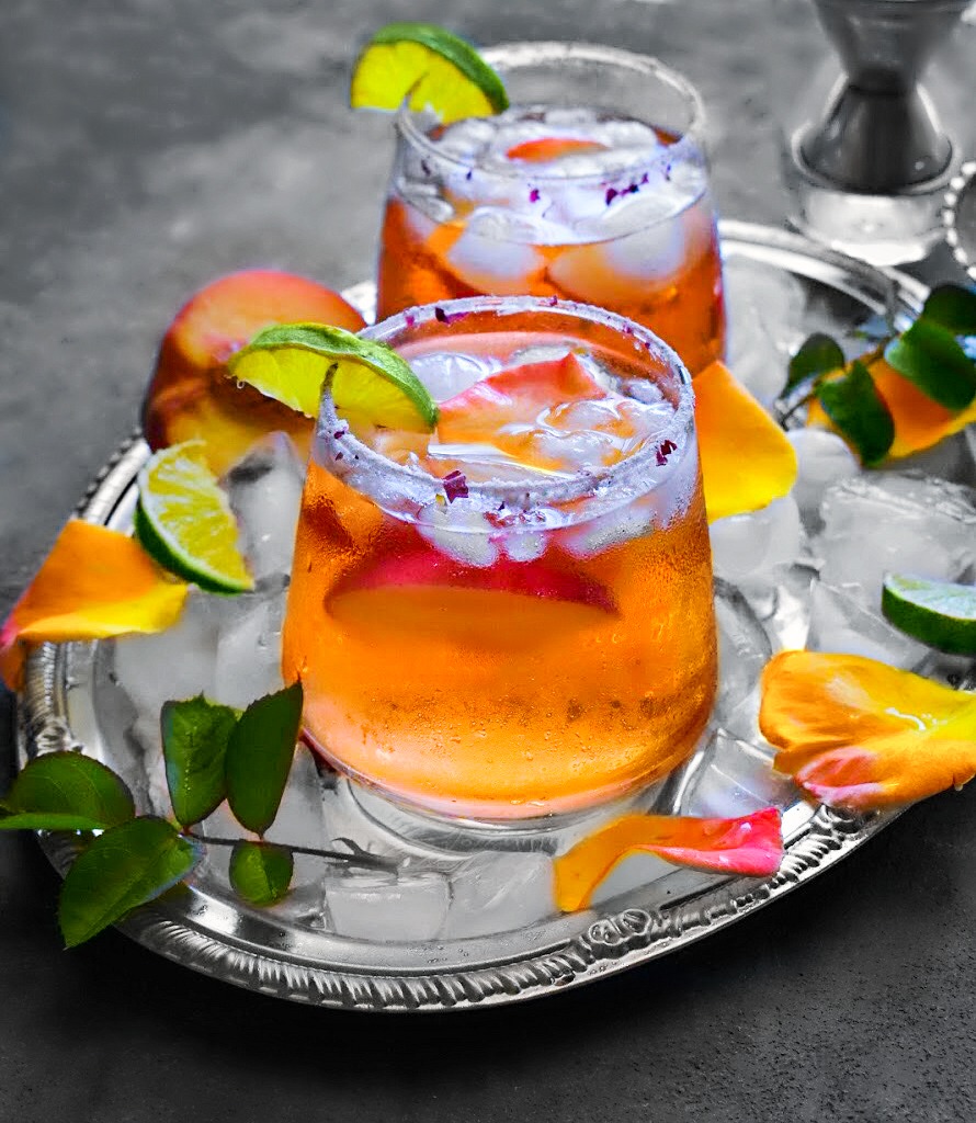 Liven up happy hour with this unique Peach Rose-a-Rita cocktail. The classic margarita gets a flavorful makeover with hints of rose and peach. This is the perfect summer cocktail for outdoor entertaining.