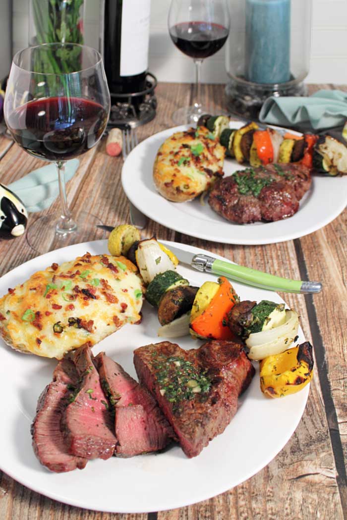 This Herb Butter Grilled Filet Mignon is the perfect centerpiece for a date night dinner, easy weeknight meal, or backyard entertaining. This 30-minute meal is complete with grilled vegetable kabobs and a glass of Cabernet Sauvignon.
