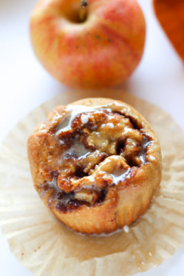 Cozy up to these Apple Cinnamon Roll Cupcakes! This fall comfort food is a fun twist on a classic dessert that's perfect for fall entertaining. Made with seasonal apples, an easy homemade dough, and topped with a delicious Cinnamon Glaze.