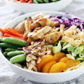 Whether you're entertaining guests or having a date night dinner in, this Chinese Chicken Mandarin Salad Bowl is perfect. Full of savory Chinese flavors, this cheap healthy meal is a quick weeknight dinner solution and delicious to boot!