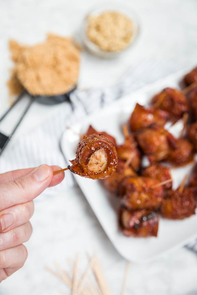Introducing your new favorite tailgating party food...Bacon-Wrapped Chicken Sausage Bites! A savory-sweet 5-ingredient appetizer with bold flavors. This small bites, easy appetizer will be the talk of the party!