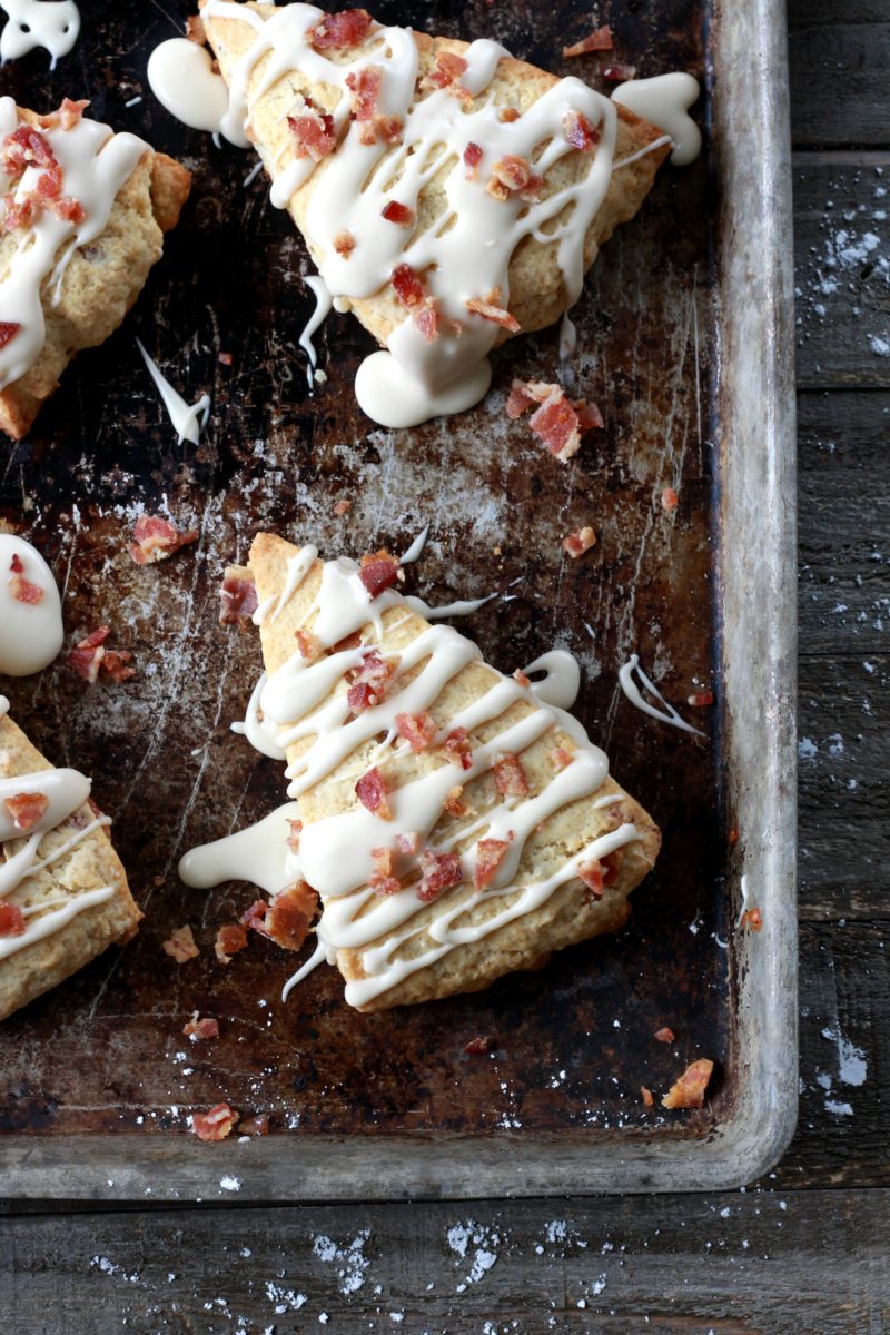 These Maple Bacon Scones are an easy breakfast idea for busy mornings, but fancy enough to serve at a Sunday brunch. Is there anything better than starting your day with a 30-minute meal of crumbly, flaky, bacon-y scones topped with maple glaze?