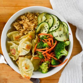 You need these Wonton Veggie Rice Bowls on your weeknight dinner rotation. This 15-minute meal, also called a power bowl, is a cheap healthy meal that delivers all the nutrients you need with whole grains, veggies, a protein, and sauce for added flavor.