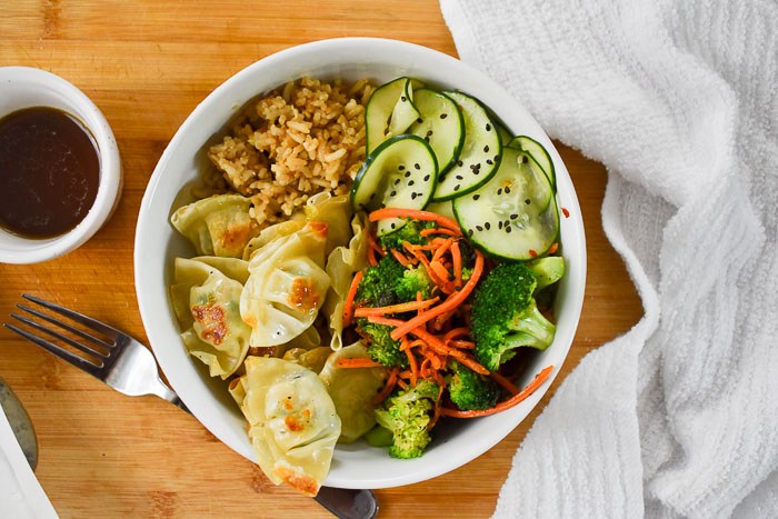 You need these Wonton Veggie Rice Bowls on your weeknight dinner rotation. This 15-minute meal, aka power bowls, is a cheap healthy meal that delivers all the nutrients you need with whole grains, veggies, a protein, and sauce for added flavor.