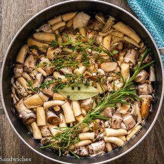 Learn how to easily make Mushroom Stock with mushroom stems and veggie scraps. This mushroom broth makes the perfect soup base, stew base, and more. Save your scraps, save money, and make homemade vegetable stock!