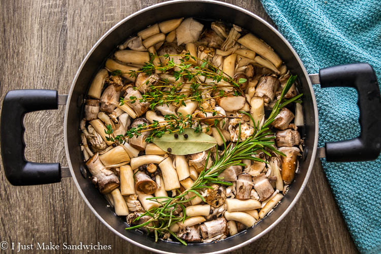 Learn how to easily make Mushroom Stock with mushroom stems and veggie scraps. This mushroom broth makes the perfect soup base, stew base, and more. Save your scraps, save money, and make homemade vegetable stock!