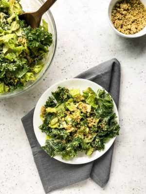 This Vegan Caesar Salad is a crowd-pleasing, deli-style salad. The dairy-free Caesar dressing is creamy, zesty, garlicy, and absolutely delicious thanks to the healthy substitution of tahini instead of mayo. This healthy side dish is just as good as the traditional Caesar salad.