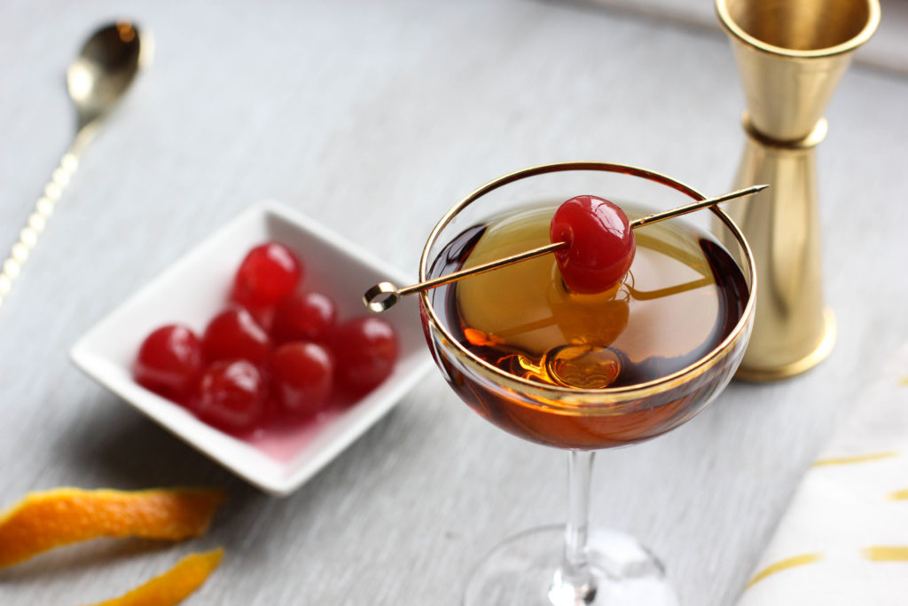 This Whiskey Manhattan Classic Cocktail will satisfy your cravings for a familiar drink with no fancy ingredients and no unique twists. This boozy cocktail is served strait up with a bitter flavor that's followed by a hint of sweetness. Perfect for happy hour!