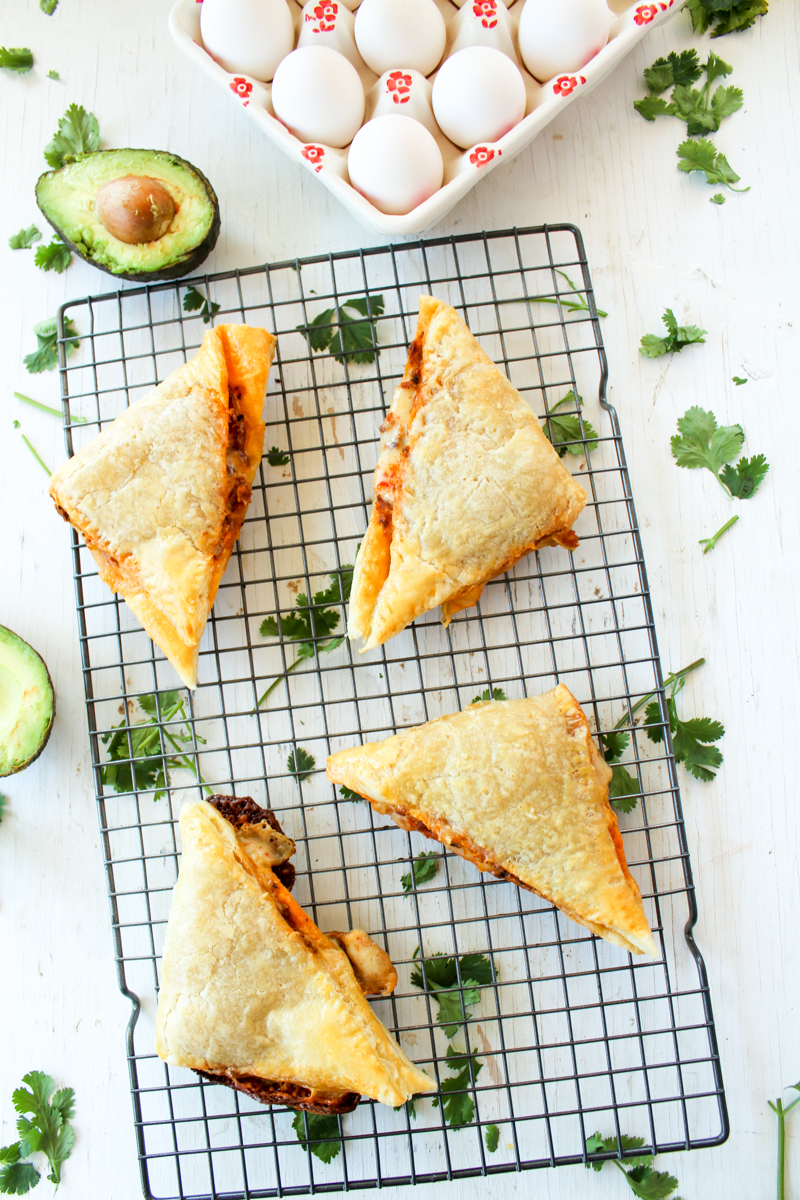 Perfect for busy mornings, these Mexican Breakfast Hot Pockets are a great on-the-go breakfast. Skip the costly drive in and opt for this budget-friendly breakfast with chorizo, eggs, black beans, cheese, and sour cream. Meal prep this make-ahead breakfast on Sunday, and enjoy a hot breakfast all week long.