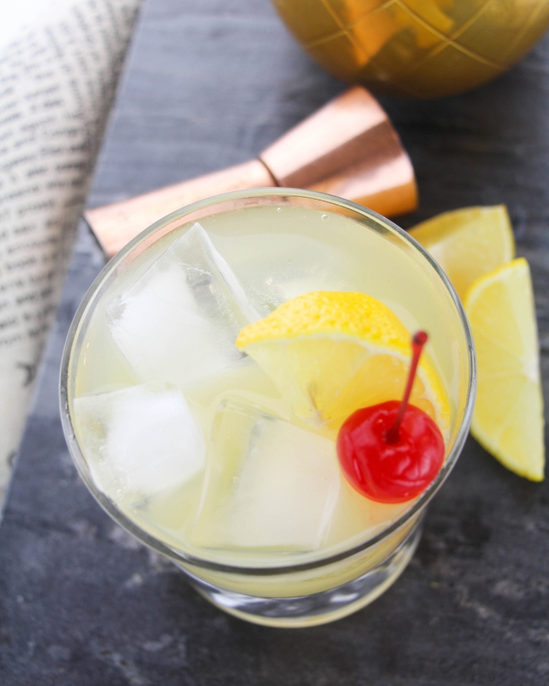 Learn how to make a Classic Whiskey Sour for your year-round entertaining needs. Perfect for happy hour during any season, this 5-ingredient, whiskey-based cocktail uses bar cart basics and it's simple enough for the novice mixologist to master!