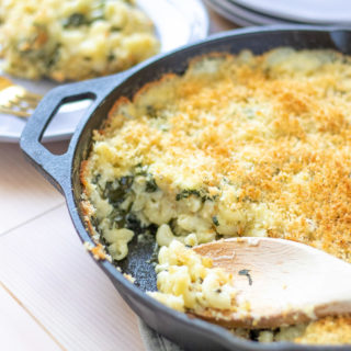 This homestyle Baked Spinach Mac N Cheese is a healthier twist on a classic side dish. Perfect for office potlucks and holiday entertaining, this portable side dish is as simple as it is delicious!