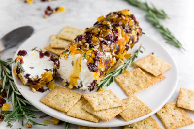 Holiday entertaining is a breeze with this simple yet stunning make-ahead appetizer. Nutty Cranberry Goat Cheese Log is an easy appetizer of goat cheese, dried cranberries, apricots, nuts, and honey.