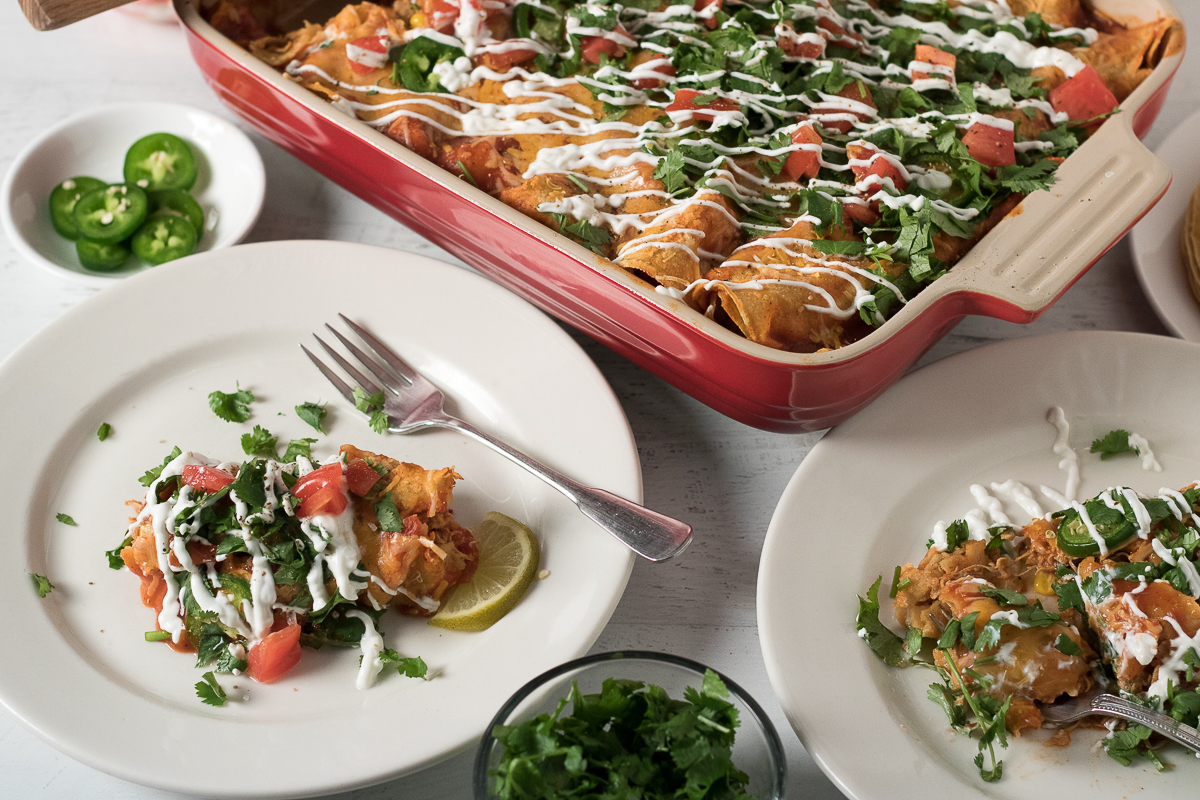 With the help of weekly meal prep, these Healthier Chicken Enchiladas are a 30-minute meal perfect for a busy weeknight dinner. Using just a few healthy ingredient swaps, this lightened up version of a traditional comfort food is simple, yet fancy enough for entertaining dinner guests.