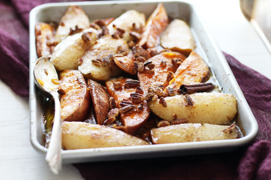 If you love seasonal produce, this Spiced Roasted Pears + Sweet Potatoes is the recipe for you! Serve as a hearty side dish or rustic dessert; either way, this one-pan dish is sure to be loved by all!