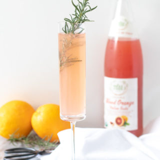 This Blood Orange Champagne Cocktail is a 4-ingredient seasonal drink that's perfect for easy entertaining. If you're hosting a holiday celebration, this festive winter cocktail needs to be on your happy hour menu!