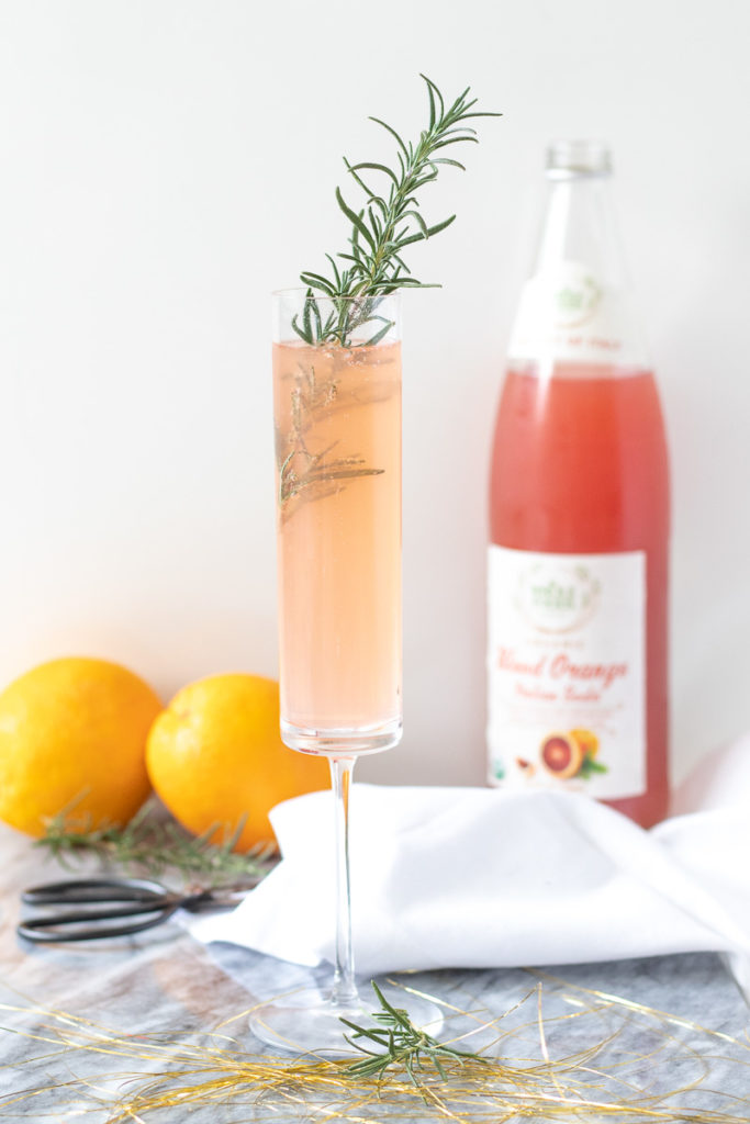 This Blood Orange Champagne Cocktail is a 4-ingredient seasonal drink that's perfect for easy entertaining. If you're hosting a holiday celebration, this festive winter cocktail needs to be on your happy hour menu!