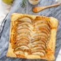 This Sweet + Savory Pear Goat Cheese Tart is the perfect 6-ingredient appetizer. If you're entertaining guests, this seasonal appetizer has everything you need with a flaky crust topped with goat cheese, Bartlett Pears, rosemary, and honey.