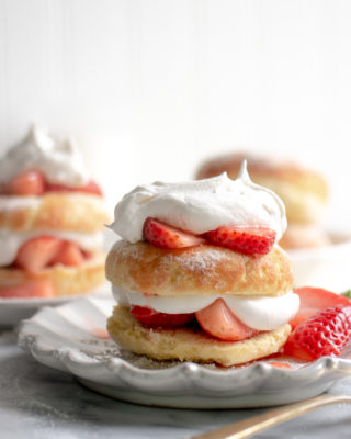 Think you can't enjoy decadent desserts on a Keto Diet? These 4-gram net carb Keto Strawberry Shortcake Donuts tell another tale! Baked to perfection, topped with no-sugar whipped cream and fresh strawberries.