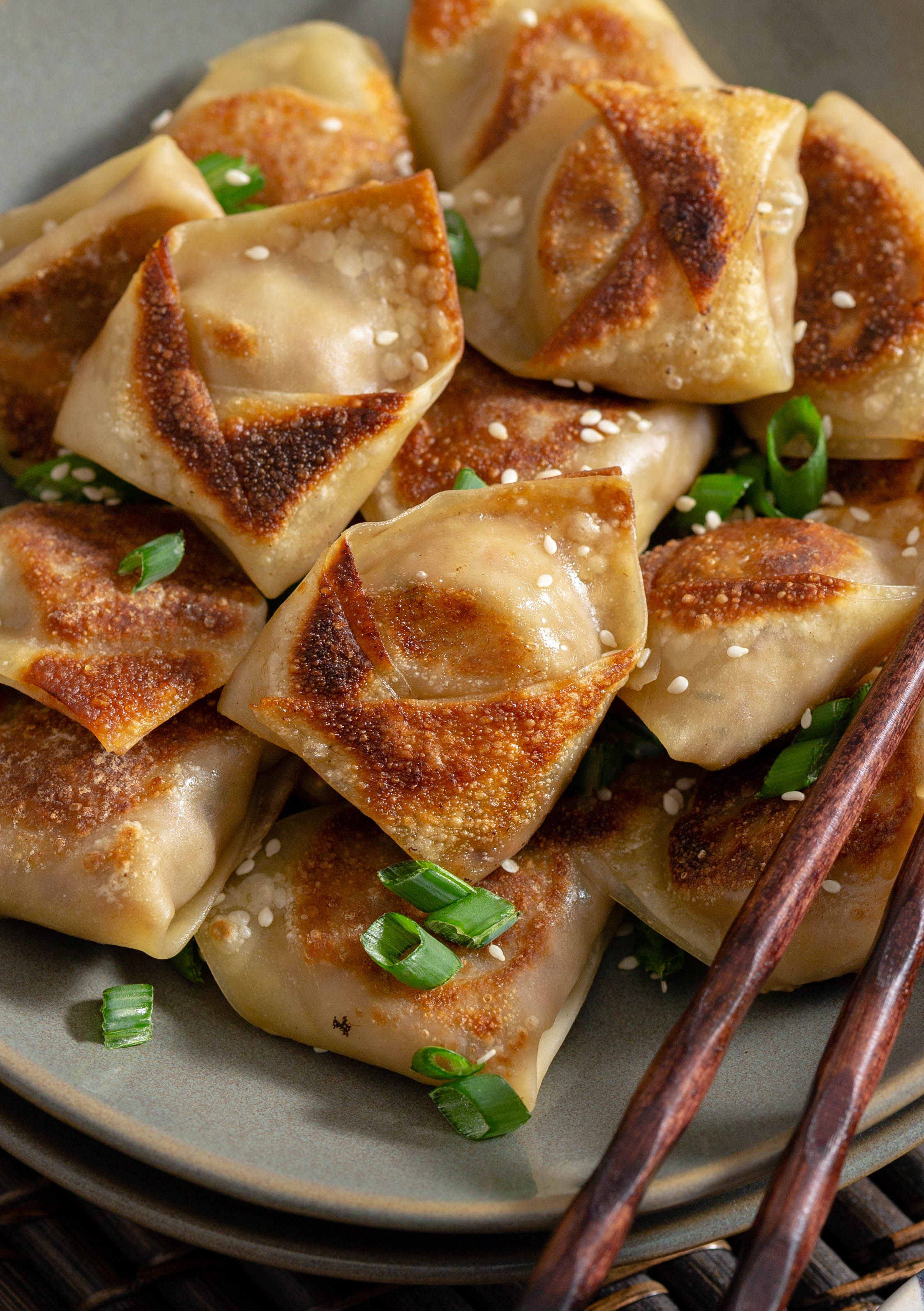 You're a fan of Asian takeout, but you're trying to only eat quality ingredients, right? Skip the pricy restaurant takeout and make these budget-friendly Fried Pork Wontons at home. These Chinese Dumplings are great as an appetizer or to compliment your stir fry.