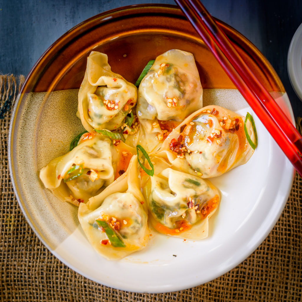 Craving your favorite Asian takeout, but tight on funds? These budget-friendly Vegetable Tofu Wontons in Chili Oil are exactly what you need! Perfect as an easy appetizer or weeknight dinner, this cheap healthy meal is simple to make and packed with flavor!