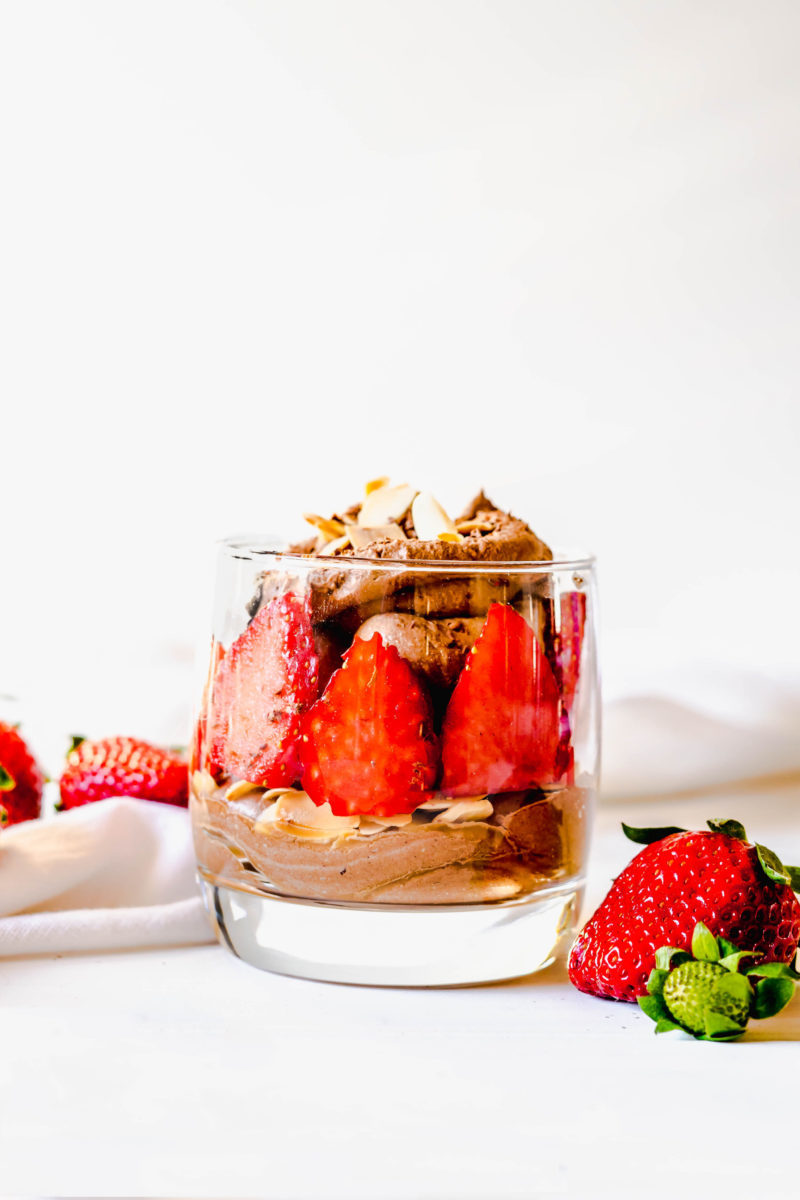 Eating better doesn't mean you have to sacrifice dessert, you just need to choose more wisely. This Chocolate Coconut Whip Parfait is a healthier dessert option that is refined sugar free. This lower calorie dessert is a dairy-free whip cream made with coconut milk, layered with fresh berries and toasted almonds. 