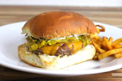 One of the most iconic dishes in New Mexico is the Green Chile Cheeseburger. This food truck style burger is piled high with diced green chiles, giving you a New Mexico inspired cheeseburger that delivers an unforgettable balance of savory and spice.
