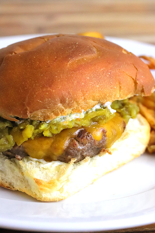 One of the most iconic dishes in New Mexico is the Green Chile Cheeseburger.  This food truck style burger is piled high with diced green chiles, giving you a New Mexico inspired cheeseburger that delivers an unforgettable balance of savory and spice.