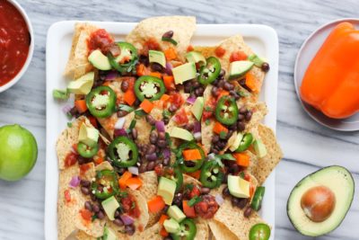 This healthier classic of traditional street food nachos uses an abundance of fresh veggies, beans, and salsa so you won’t even miss the meat or cheese. These Vegan Street Food Nachos are just like grabbing your favorite food truck indulgence, but it’s a healthier quick appetizer!