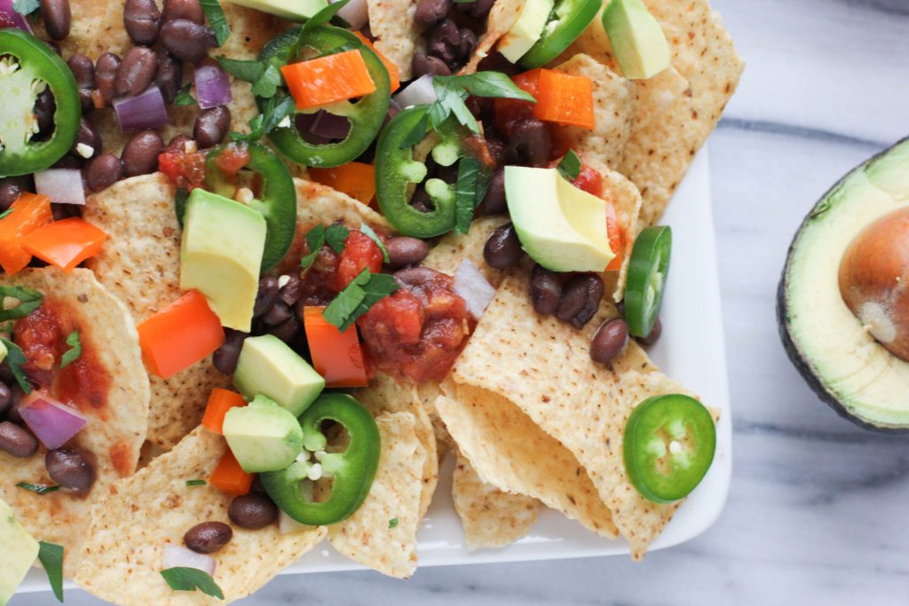 This healthier classic of traditional street food nachos uses an abundance of fresh veggies, beans, and salsa so you won’t even miss the meat or cheese. These Street Food Vegan Nachos are just like grabbing your favorite food truck indulgence, but it’s a healthier quick appetizer!