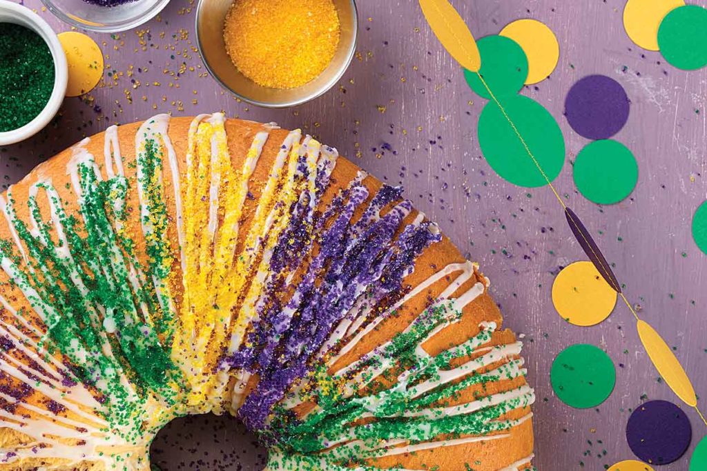 It's not a traditional Mardi Gras celebration until someone finds the baby in the King Cake! Typically, king cake is made of a rich, brioche dough and other complicated ingredients, but you can enjoy these five easy DIY Mardi Gras King Cake Recipes at home with simple kitchen staples you already have on hand!