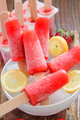 Strawberry Lemonade Daiquiri Popsicles use farmers market ingredients and rum for a gourmet popsicle perfect for warm-weather happy hour entertaining.