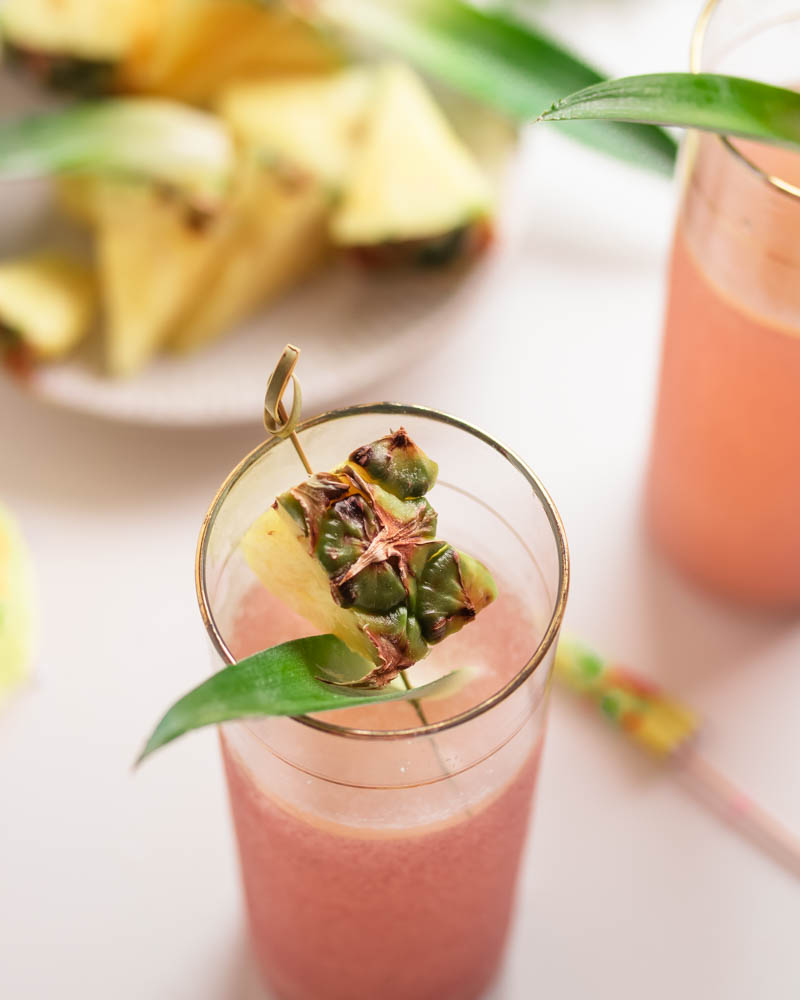 As the weather warms up, it's time for more outdoor entertaining and what better way to celebrate than with a 5-ingredient healthier cocktail? This Fizzy Pineapple Kombucha Cocktail is the summer cocktail dreams are made of!
