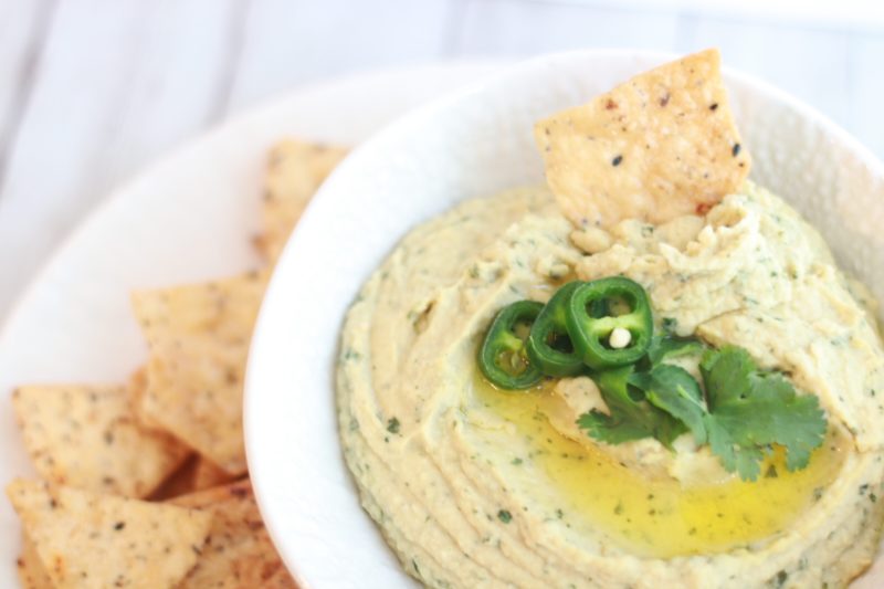 Talk about an easy appetizer! This Instant Pot Cilantro Jalapeño Hummus uses dried chickpeas to create a creamy hummus full of flavor in about an hour. Using the pressure cooker means no soaking of the garbanzo beans is required!