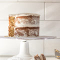 This Banana Bread Cake {with gluten-free option} is a healthier cake recipe you can feel good about. A double layer cake with a naturally-sweet Vegan Coconut Frosting.