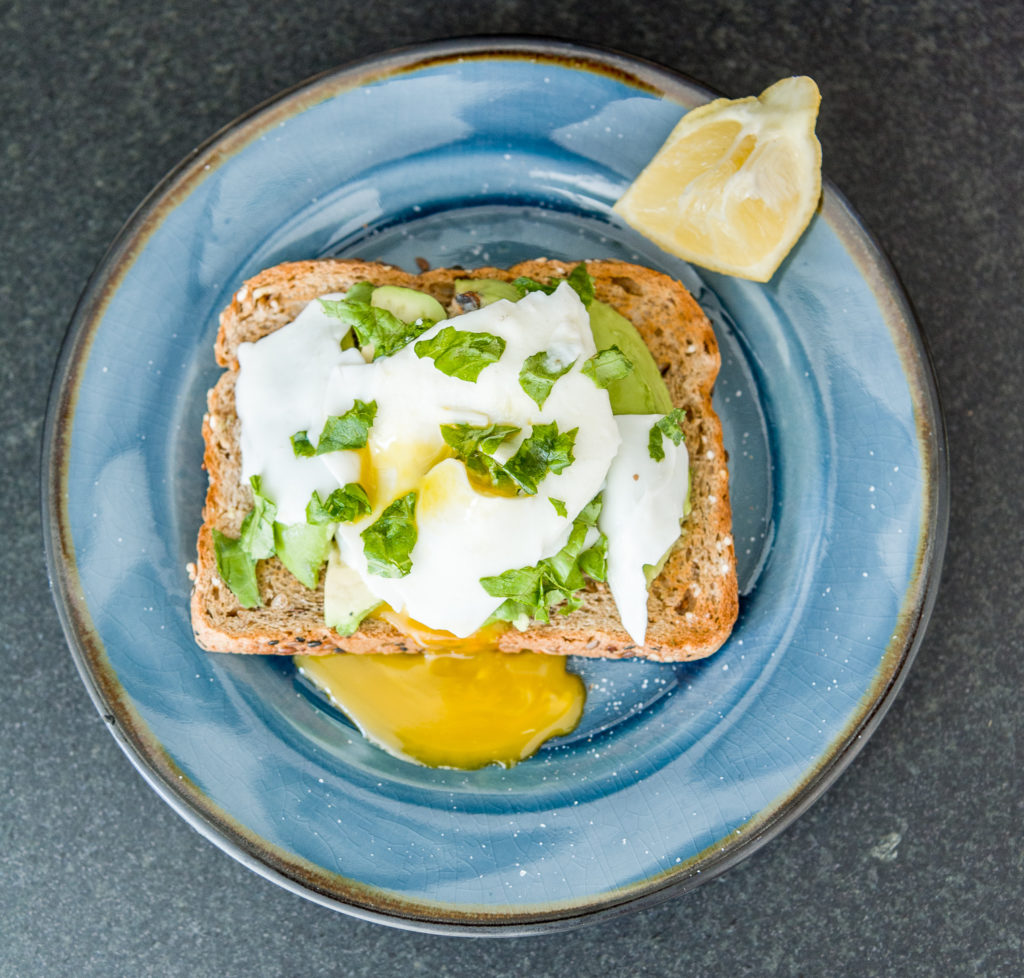 Need an easy 10-minute, hearty breakfast? Try this Poached Egg Avocado Toast! A healthy whole food breakfast with protein and nutrients. Learn how to make a poached egg the easy way!