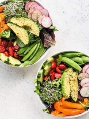 This Farmers Market Salad is filled with colorful, fresh veggies, creamy avocado, and homemade sweet basil dressing. Perfect as an easy lunch or light dinner, this spring salad is customizable with whatever fresh farmers market produce you have on hand!