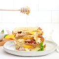 Sweet, salty, and full of cheesy goodness, this gourmet Georgia Peach Prosciutto Grilled Cheese is a grown up version of a childhood classic grilled cheese. A 15-minute meal that delivers a deli-style sandwich at a fraction of the price.