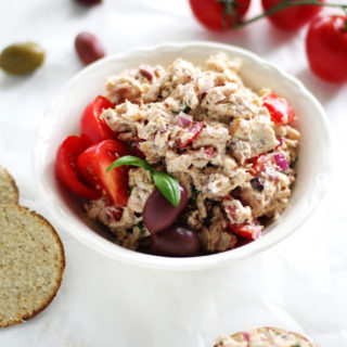 You'll love this Mediterranean Chicken Salad recipe. It's a guilt-free lunch with tender chicken, Greek yogurt dressing, Campari tomatoes, and Kalamata olives. A few surprise ingredients give this lightened up chicken salad a unique taste.