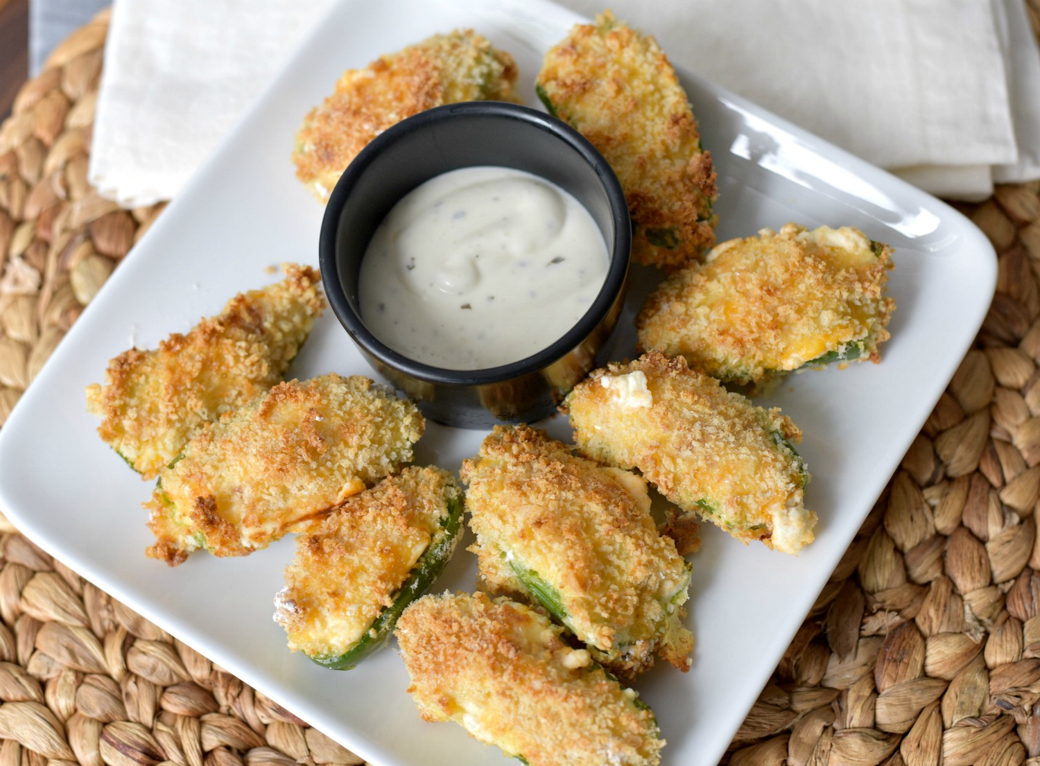 Looking for an easy appetizer? Try these Spicy Sweet Air Fryer Jalapeño Poppers! Ready in under 20 minutes, these crispy small bites are stuffed with cream cheese, cheddar, bacon, and jalapeño jelly.