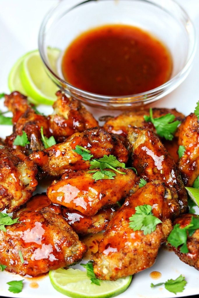 Love crispy chicken wings, but don't want to deal with all of the oil? These healthier, Keto-Friendly Air Fryer Thai Chili Chicken Wings are the answer. A 30-minute meal full of bold Thai flavor everyone will love!