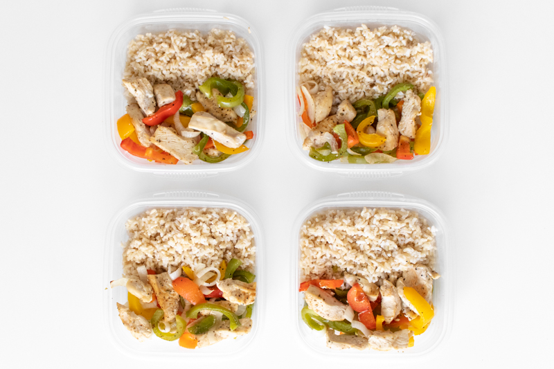 Make weekly meal prep a breeze with this simple Chicken Fajita Bowl recipe you can customize with your favorite toppings. In just 30 minutes, you can have healthy lunches ready for the whole week!