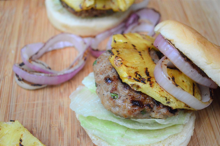 These Grilled Pineapple Teriyaki Turkey Burgers with grilled onions take outdoor grilling to a new level! Grilled turkey burgers are a low-fat option to traditional grilled burgers and the sweet and tangy taste of these will leave you drooling!