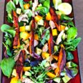 This Mango Chicken Sweet Potato Salad is an easy weeknight meal that's sure to satisfy. This dinner salad has layers of warm sweet potatoes and chicken on top of fresh, farmers market produce.
