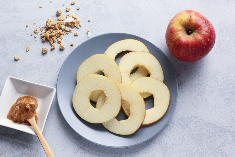 Looking for a healthy after-school snack idea? These Peanut Butter Granola Apple Bites are a kid-friendly snack using sliced apples and good-for-you toppings. You can even make this healthy snack dairy and gluten free!