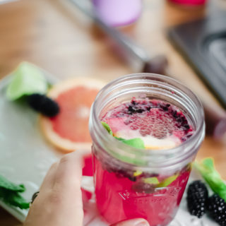 This Grapefruit Blackberry Mimosa Mocktail is perfect for summer entertaining since it contains no alcohol. Made with good-for-you ingredients, including a shot of hemp, this fruit-infused drink won't leave you feeling tired or bloated.