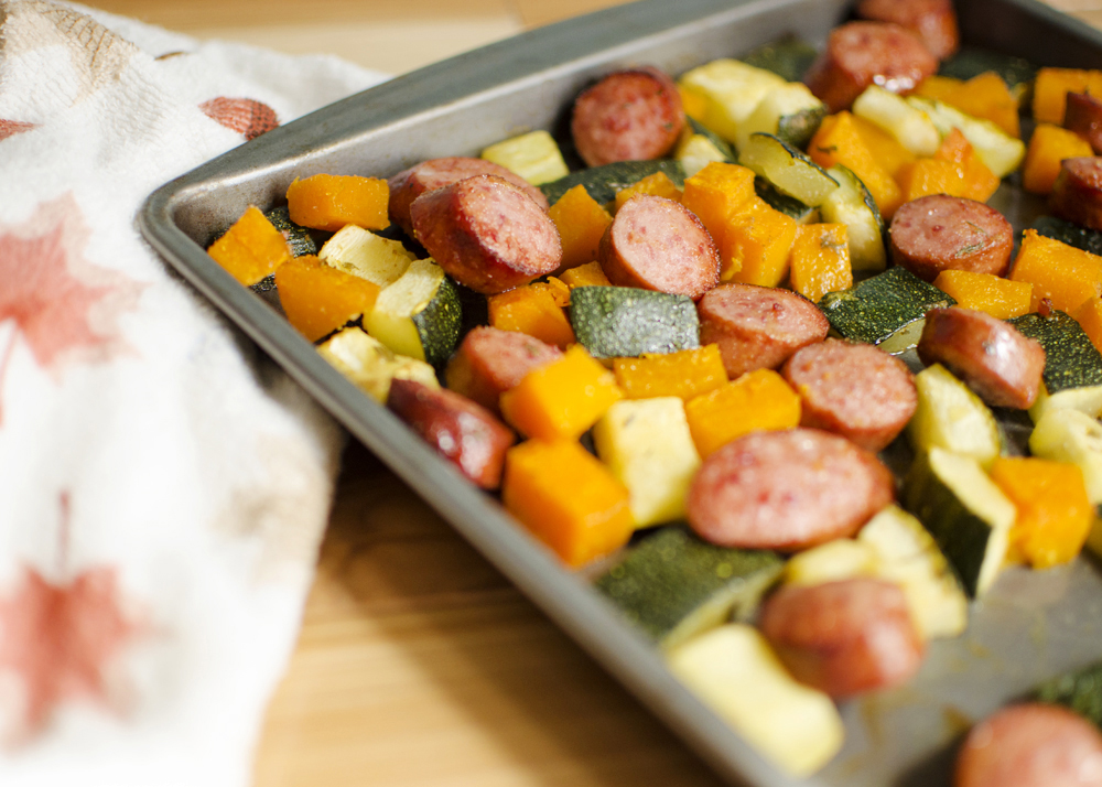 Butternut squash, zucchini, and skinless smoked turkey sausage shine in this 30-minute meal that is completely perfect for fall. Full of fall flavors, there's nothing not to love about this easy Harvest Sheet Pan Dinner!